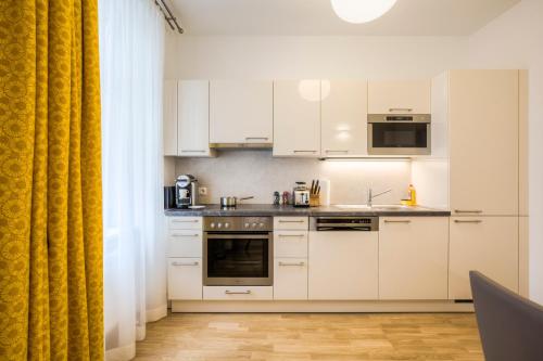 Vienna Grand Apartments City - image 3