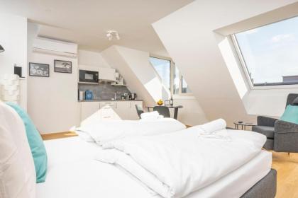 Rooftop Apartments mit großer Terrasse - image 22