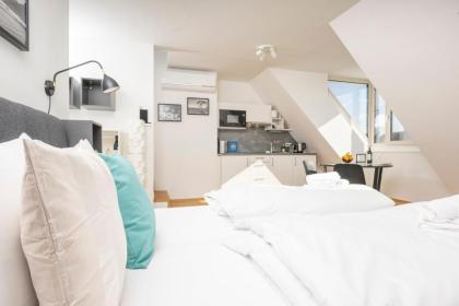 Rooftop Apartments mit großer Terrasse - image 25